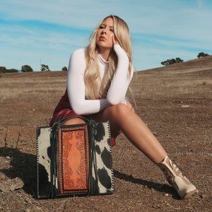 The Luxe Cowgirl a Haute Southern Hyde by Beth Marie Exclusive Cowhide Bag